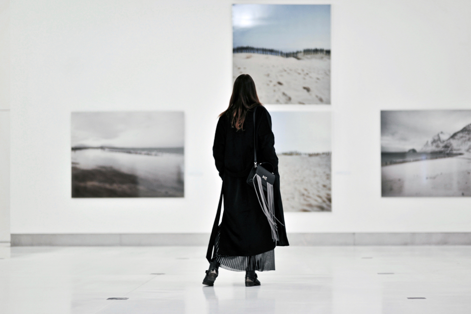 black-oversized-coat-and-acne-scarf-street-style