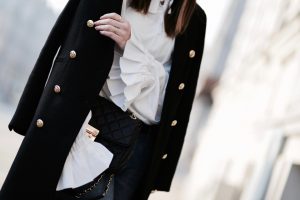 black coat with gold buttons outfit